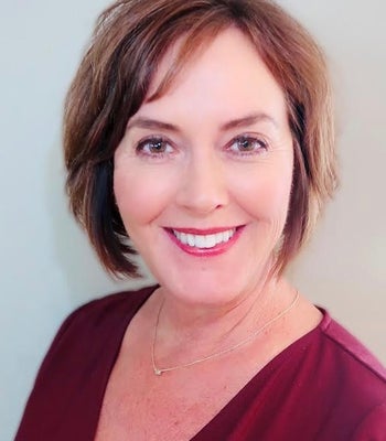 Portrait of Michel Bueno, Realtor Associate.