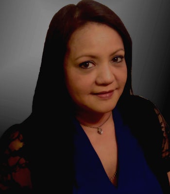 Portrait of Neyda Hughes, Realtor Associate.